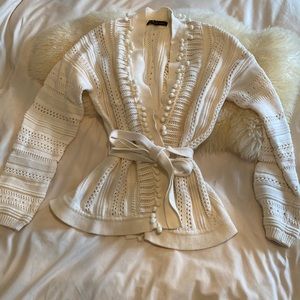 Pompom belted cardigan sweater